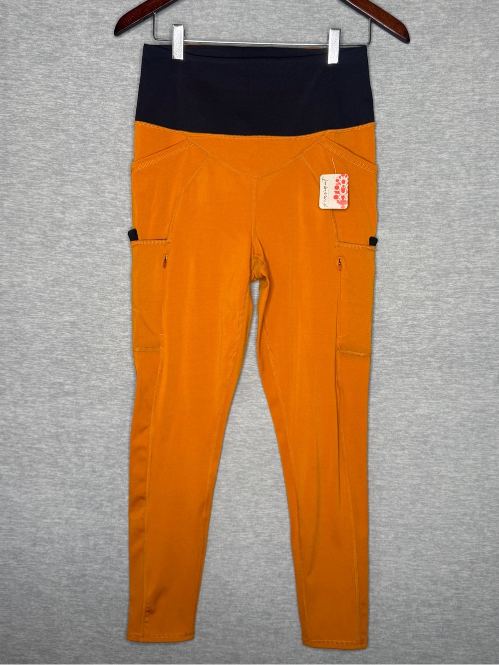 Free People FP Movement Leggings M Orange Black High Rise Zip Pockets NWT $128